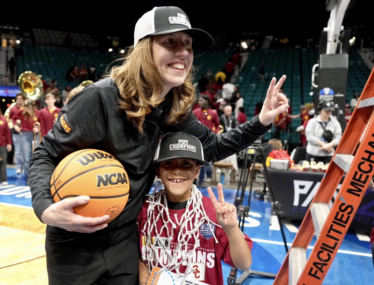 Lindsay Gottlieb and son Jordan Martin celebrate